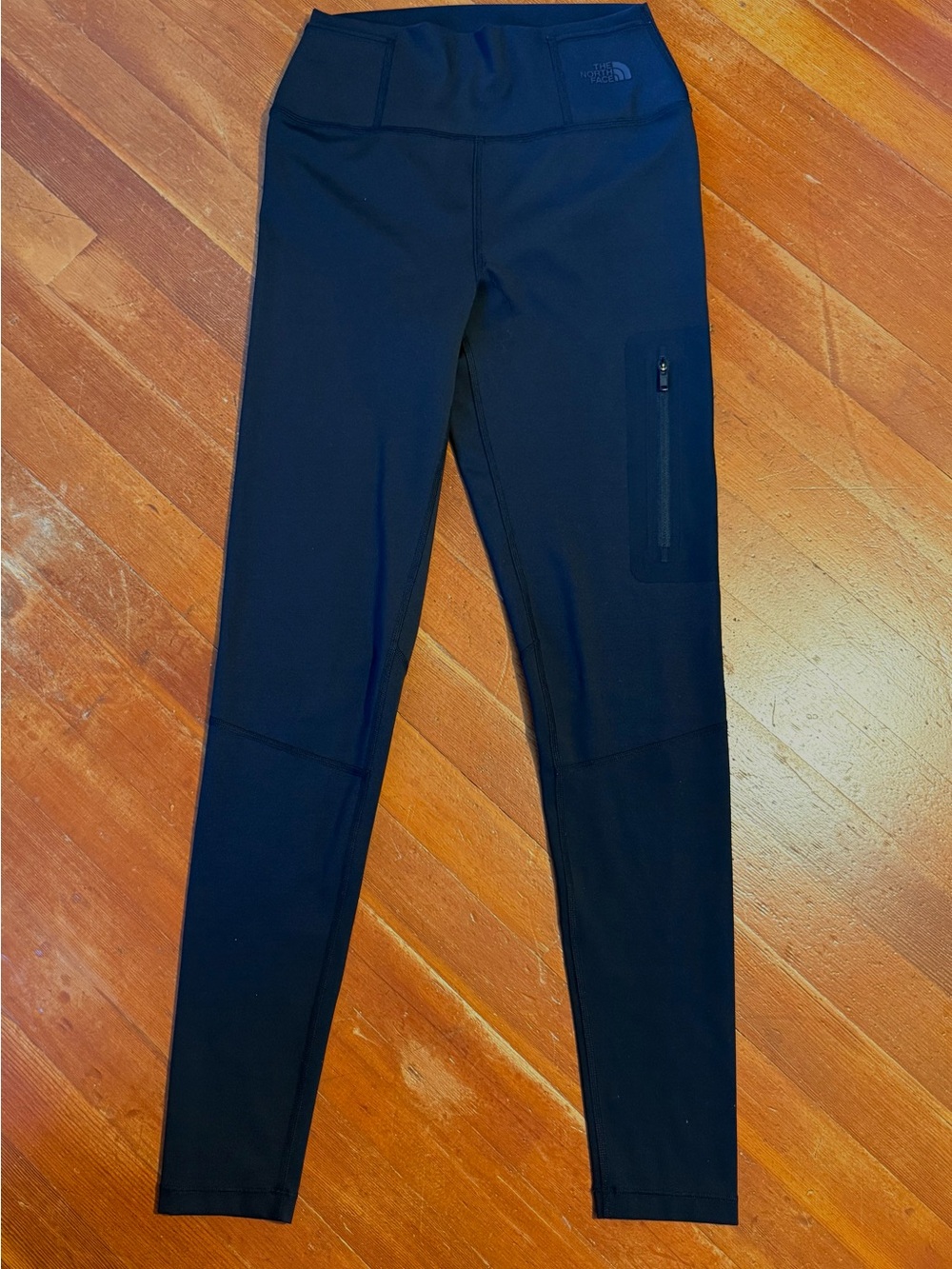 The North Face Black Youth Performance Leggings with Zippered Thigh Pocket